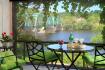 Queen room with riverside screened porch